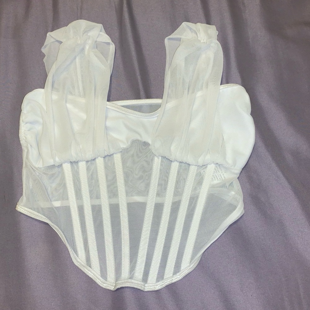 White corset and it has boning. Used once.